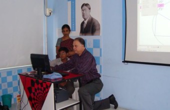 Teaching a class in a math lab designed by Steve and business partner NIIT in Chennai, India, 2007.