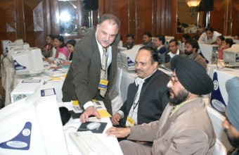 Conducting a hands-on workshop in New Delhi for 150 Indian school teachers in 2004.